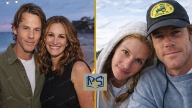 Daniel Moder and Julia Roberts smiling together in a couple photo