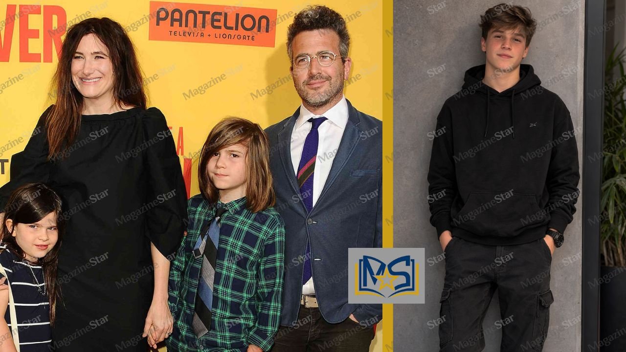 Kathryn Hahn and Ethan Sandler with their son Leonard Sandler at a red carpet movie premiere.