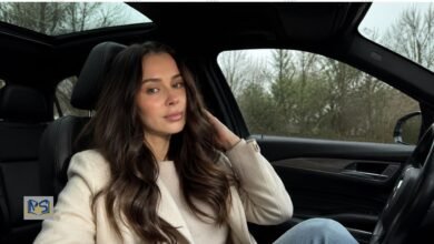 Lifestyle image for a Kennedy Alexa profile showing a brunette woman seated inside a luxury car