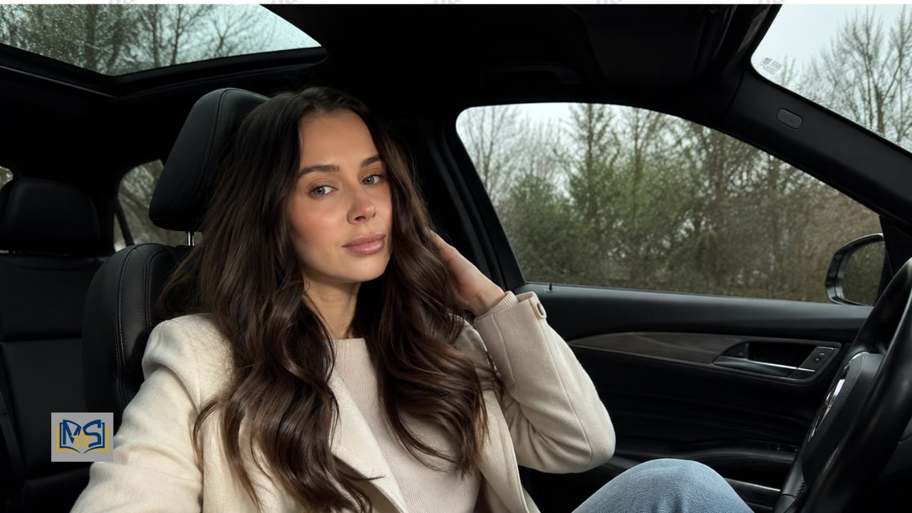 Lifestyle image for a Kennedy Alexa profile showing a brunette woman seated inside a luxury car