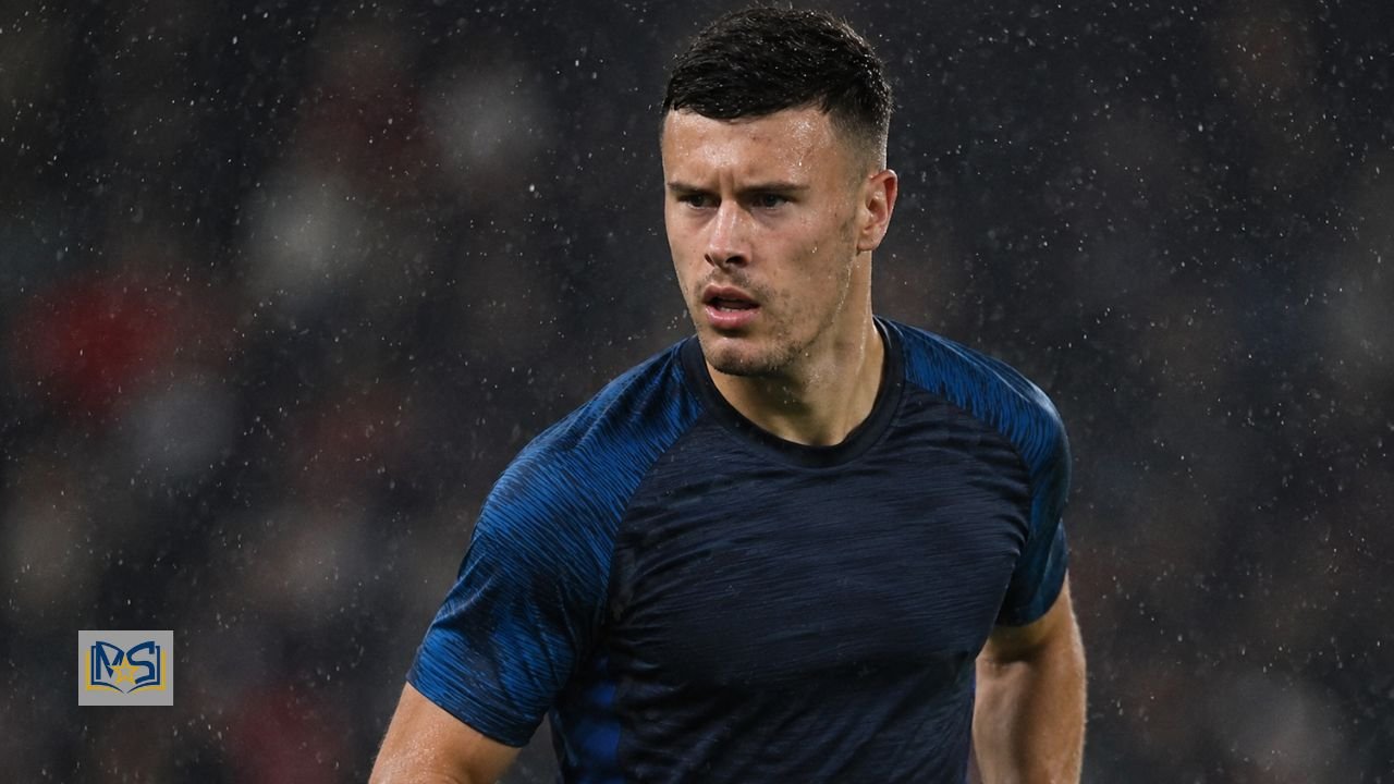 Footballer training in the rain, illustrating Sam Bowen’s influence on Jarrod Bowen’s career